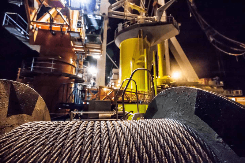 The foundation of an offshore windturbine and the cable that takes electricity to shore from one of Ørsted's established windfarms